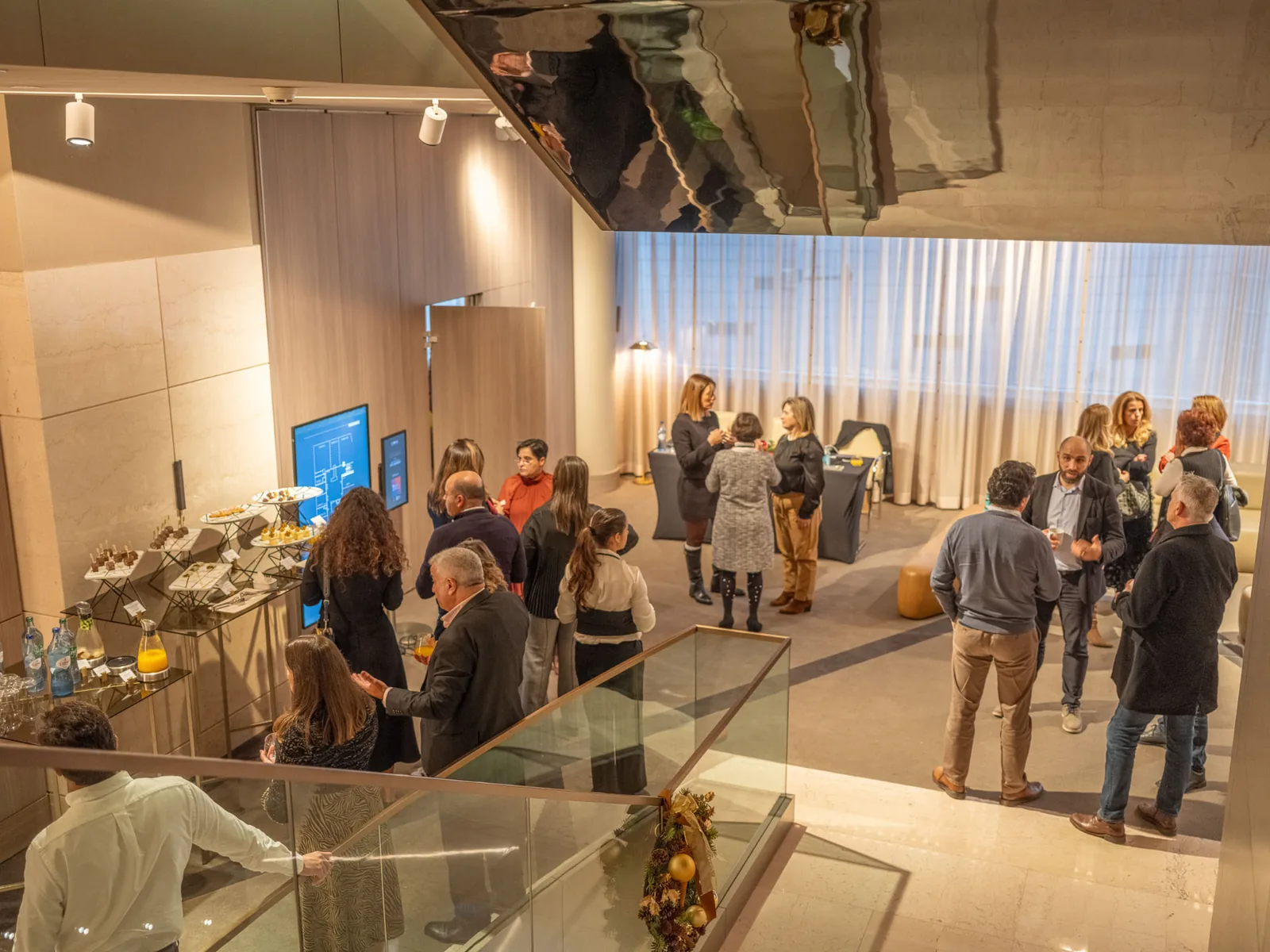 CNLP members networking at an indoor reception